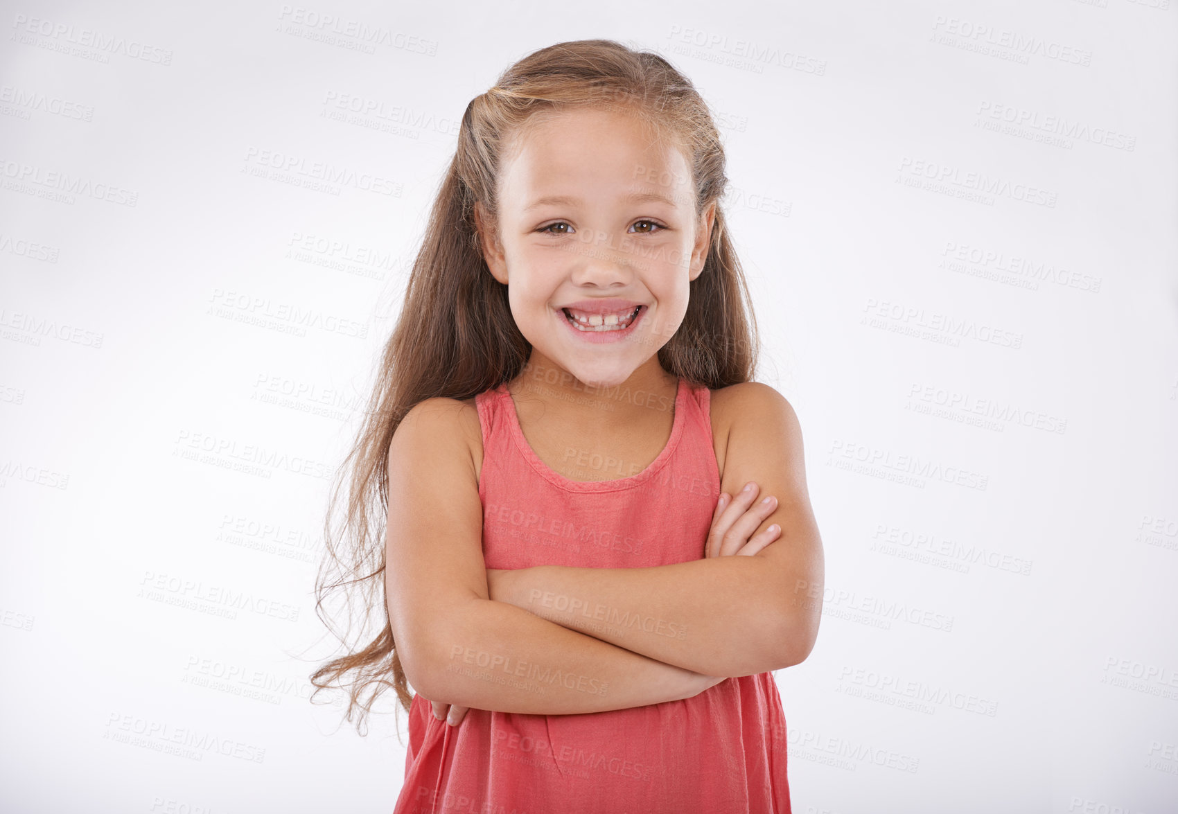 Buy stock photo Child, smile and portrait or confidence with arms crossed in studio for good mood, happy or relax. Female person, girl model and face or white background as mockup space or proud, peace or positivity