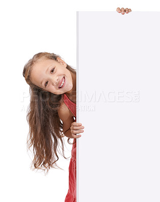 Buy stock photo Girl, child and poster portrait and mockup space for advertising, presentation and banner on white background. Youth with news, announcement with sign or notice, billboard and placard in studio