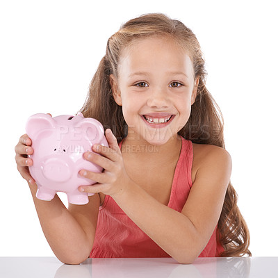 Buy stock photo Piggy bank, save money and girl child in portrait, finance and learning cash management on white background. Budget, growth and investment, young person and financial security for future in studio
