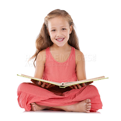 Buy stock photo Portrait, happy and child reading books in studio for learning, language development and studying knowledge on white background. Young girl, kid and sitting on floor for story, education and literacy