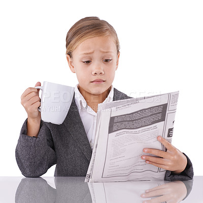 Buy stock photo Shocked child, reading newspaper or studio with confused for business, coffee or surprise by daily headlines. Little girl, suit or thinking by mug as pretend professional or funny by white background