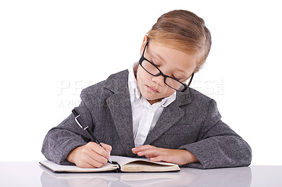 Buy stock photo Business person, notebook and child writing notes in studio, ideas and planning for company growth. Female person, pretend employee and journal for strategy, schedule and diary on white background