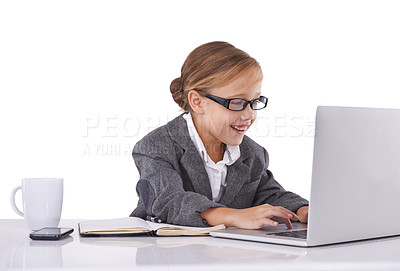 Buy stock photo Business person, child and typing on laptop in studio, email and report or proposal on white background. Female person, pretend professional and playing fantasy game on tech, web and online research