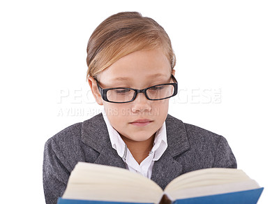 Buy stock photo Girl, child and reading book for knowledge in studio, learning and fiction novel on white background. Female person, story and information for imagination development, education and studying literacy