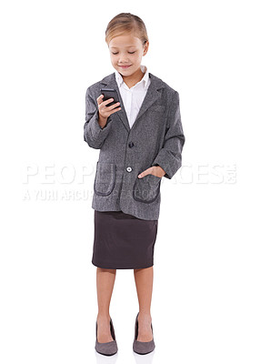 Buy stock photo Child, business and typing an email on phone in studio communication and network on white background. Female person, pretend professional and playing fantasy game, full body and texting on mobile app