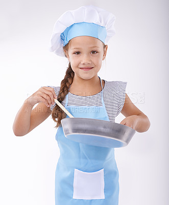 Buy stock photo Child, chef and portrait with apron, confident and development on white background. Culinary skills, happy and learning to cook, food and childhood growth with confidence in hospitality industry