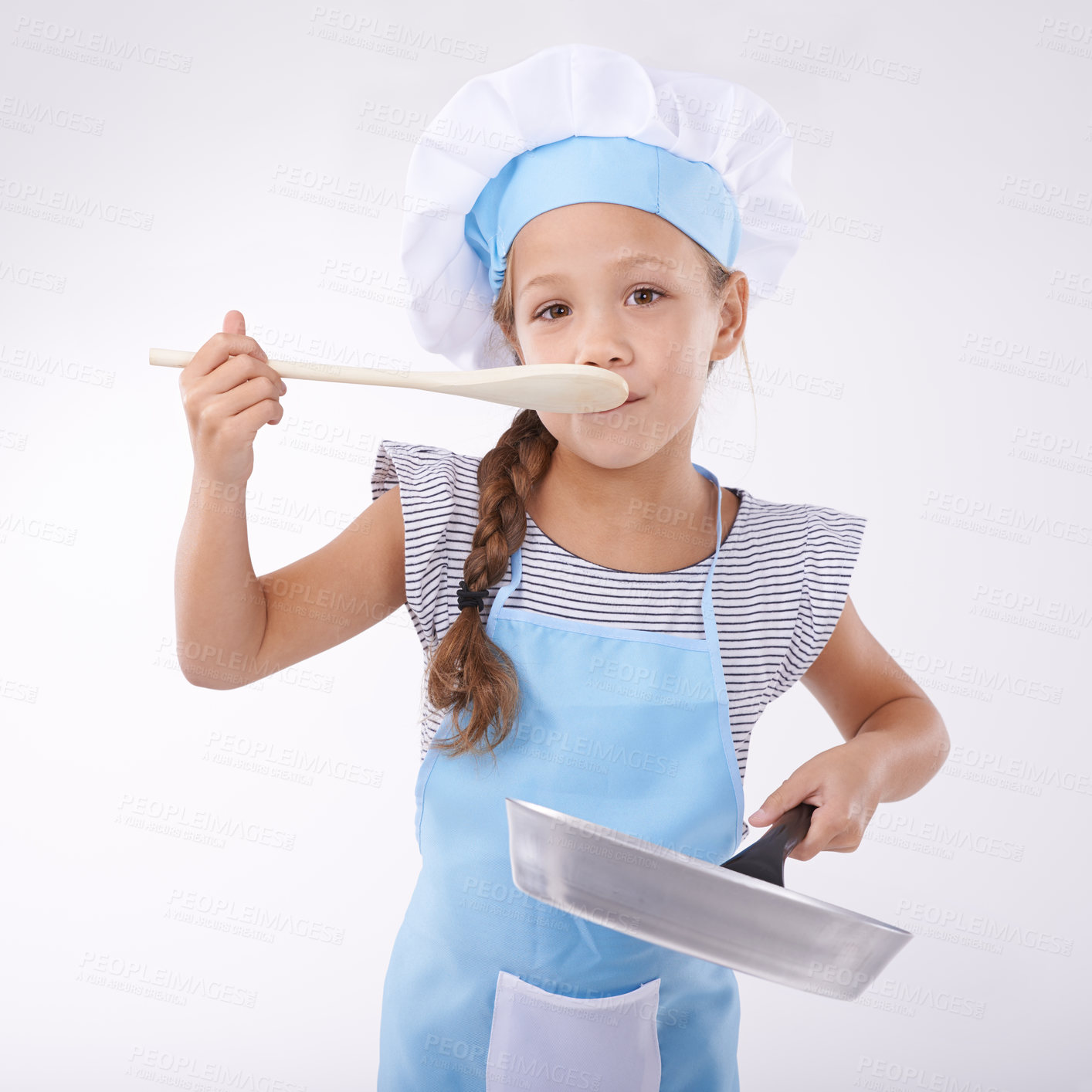Buy stock photo Kid, chef and portrait for tasting food, confident and child development on white background. Culinary skills, happy or ready to cooking or childhood growth with confidence in hospitality industry