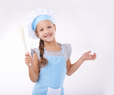 Buy stock photo Kid, chef and portrait with spatula, happy and child development on white background. Culinary skills, young and learn to cook food and childhood growth with confidence in hospitality industry