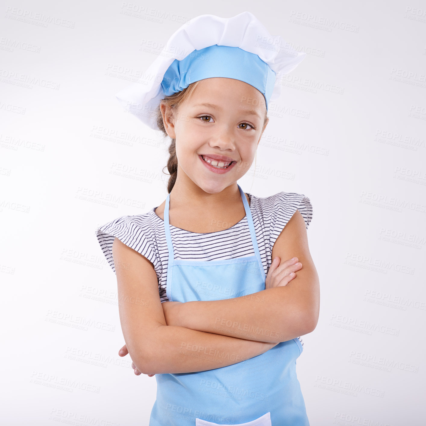 Buy stock photo Kid, chef and portrait with arms crossed, confident and child development on white background. Culinary skills, happy and ready to cook food and childhood growth with face in hospitality industry