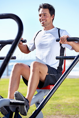 Buy stock photo Happy man, fitness and shoulder press on park equipment for gym workout, exercise or training in nature. Fit, active and strong male exercising on outdoor machine for muscle, chest or weightlifting
