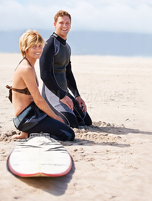 Buy stock photo Young surfers enjoying a day out on the beach in the summertime