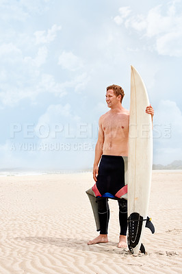 Buy stock photo Thinking, smile and shirtless man with surfboard on beach in wetsuit for sports, travel or fitness. Nature, vision and body of young surfer on sand by ocean or sea for exercise, training and workout