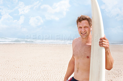 Buy stock photo Portrait, smile on beach and man with surfboard on blue sky for sports, travel or fitness. Nature, space and shirtless young surfer on sand by ocean or sea for exercise, training and workout