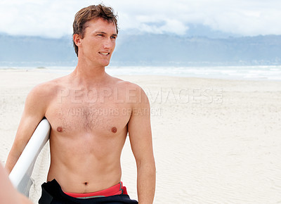 Buy stock photo Thinking, serious and shirtless man with surfboard on beach in wetsuit for sports, travel or fitness. Nature, vision and body of confident surfer on sand by ocean or sea for exercise and training