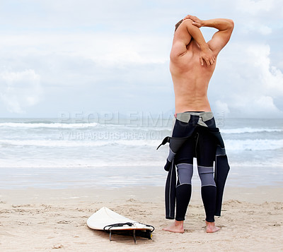 Buy stock photo Back of surfer, man is stretching and beach, surfboard for ocean waves and start fitness, adventure and travel. Nature, vacation and surfing in Hawaii, summer holiday on an island and extreme sports