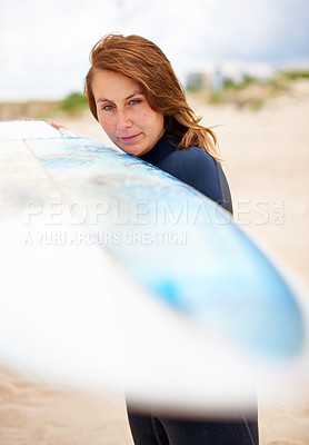 Buy stock photo Beach, holding or woman with surfboard on vacation for fitness training, wellness or travel. Athlete, surfer cleaning or ready to start surfing at sea on holiday in Hawaii or ocean in extreme sports