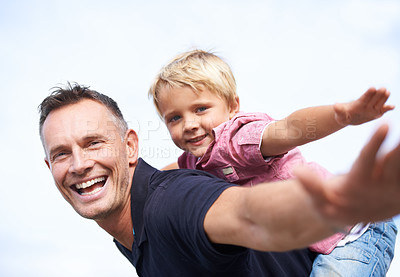 Buy stock photo Father, son and happy with airplane game by outdoor, freedom and fun with love bonding in city. Man, child or playing fantasy flying by arms in air, childhood and trust together in nature outside
