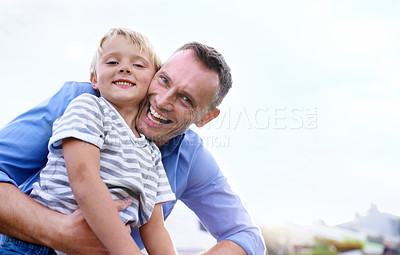 Buy stock photo Father, son and portrait with hug outdoor for bonding, holiday or vacation memories with blue sky. Family, man and boy child with embrace for relationship, love or care in nature with smile or mockup