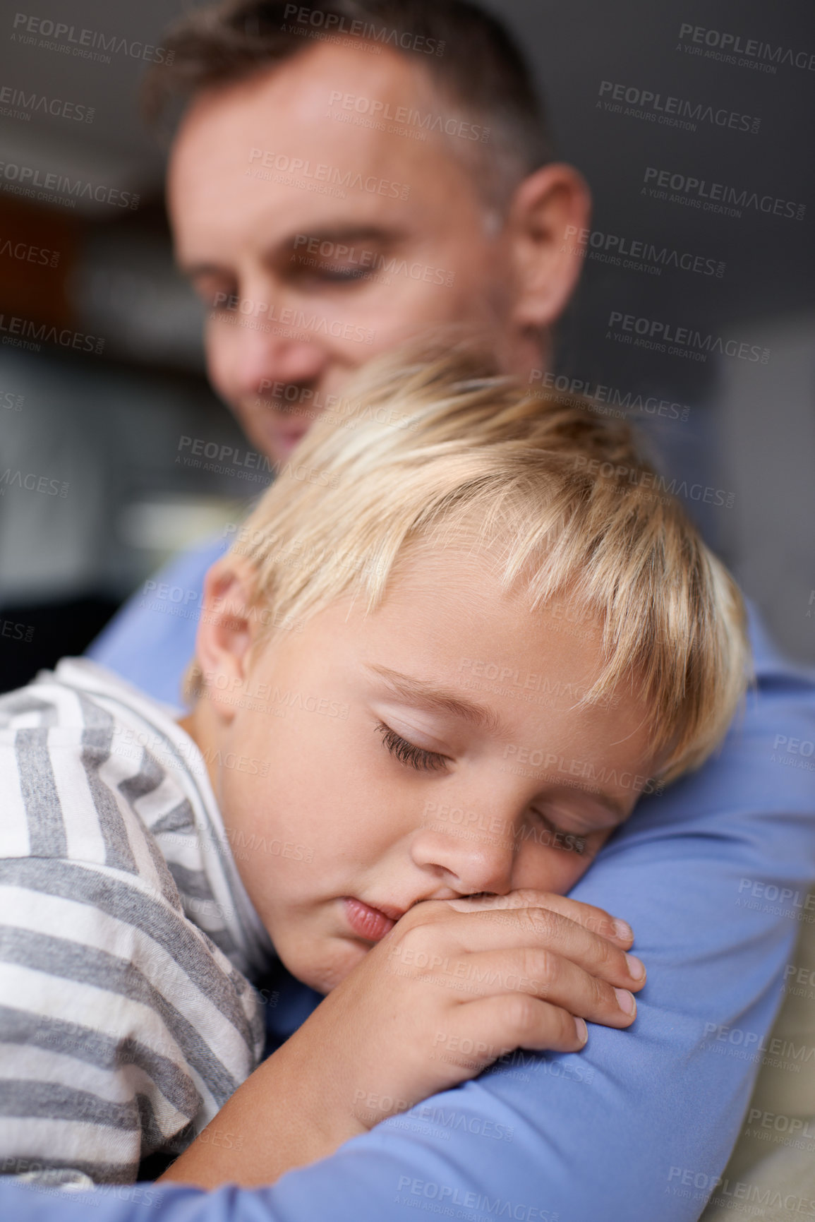 Buy stock photo Father, son and sleeping with hug in home with bonding, trust and support in living room of house. Family, man and parent or boy child with rest, dreaming and tired or relax in lounge of apartment