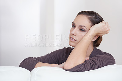 Buy stock photo Thinking, relax and calm woman on a sofa with memory, remember or nostalgia in her home. Peaceful, face and female person chilling in a living room on weekend, vacation or day off for daydreaming