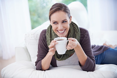 Buy stock photo Coffee, thinking and happy woman relax on a sofa with memory, moment or reflection in her home. Tea, break and female person in a living room with comfort, beverage or day off, me time or self care