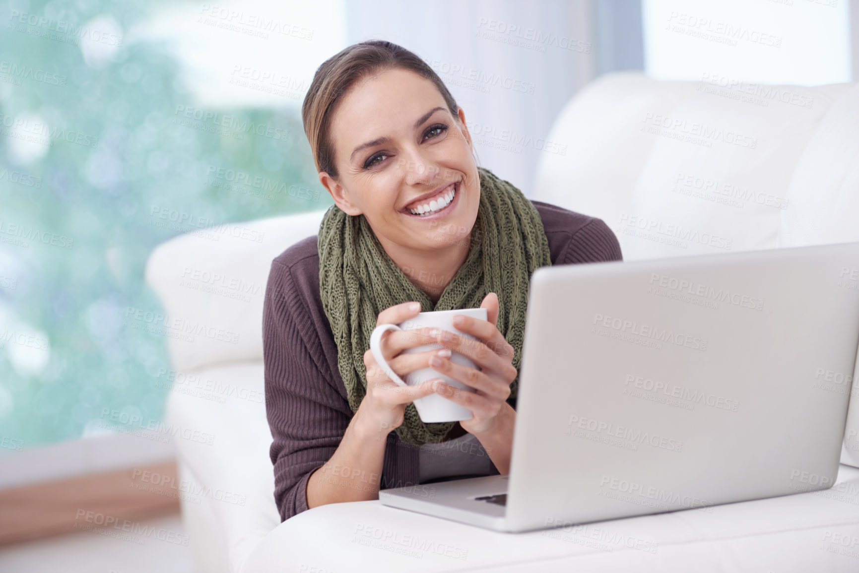 Buy stock photo Happy woman, portrait or coffee with laptop on sofa for streaming movie, film or video at home. Face, smile or female person relax in living room with pc, tea or social media, subscription or service