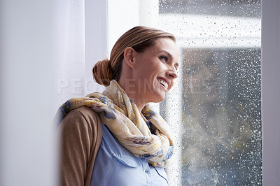 Buy stock photo Thinking, rain and woman by window in home for nostalgia, wondering and remember in living room. Inspiration, daydreaming and person with thoughtful, contemplating and memory in house in winter