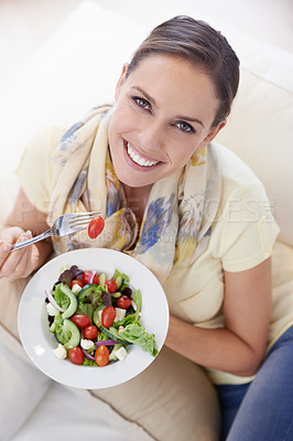 Buy stock photo Top view of woman, eating salad and food for nutrition, vegetables and lunch with happiness in portrait. Diet, wellness and healthy vegan meal for cholesterol, detox and snack for dinner at home