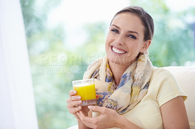 Buy stock photo Portrait, smile or happy woman in home with orange juice for vitamin c in lounge to relax on a break. Apartment, wellness or female person drinking a fresh beverage for healthy nutrition or hydration