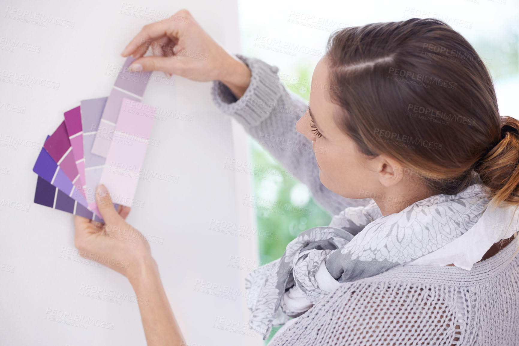 Buy stock photo Painting, home renovation and woman with sample for color choice, comparison or tone in house. Interior design, paint swatch by lady person at wall for planning, decoration or DIY remodeling project