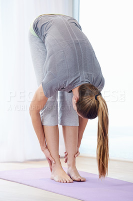 Buy stock photo Woman, stretching legs and yoga for health, wellness and warm up in home with holistic fitness or workout. Person, yogi or lady for flexibility, muscle and body for balance in practice or pilates 