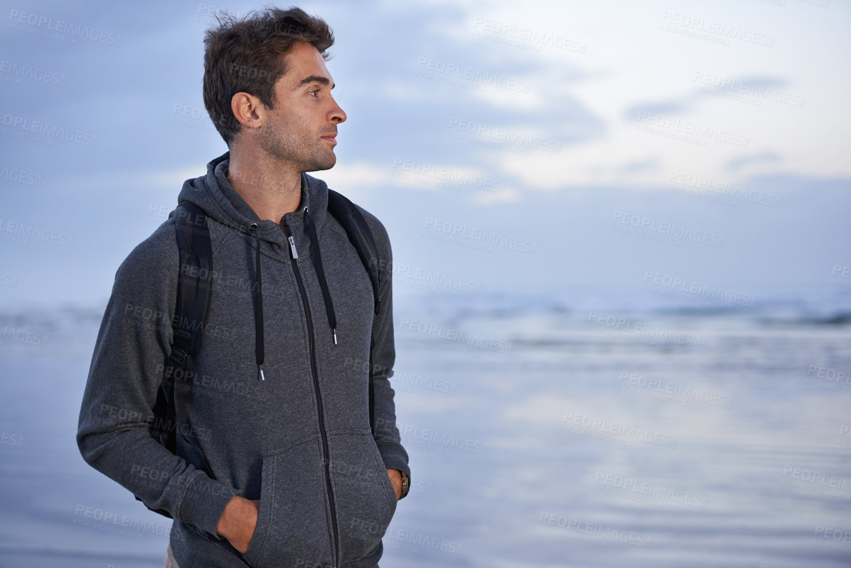 Buy stock photo Thinking, beach and man with holiday, travel and backpack with vacation, summer break or getaway trip. Person, seaside or traveller with nature or wellness with water, explore or adventure or journey