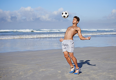 Buy stock photo Man, beach and playing with soccer ball for game, sports or exercise in outdoor hobby, training or practice. Young muscular male person or football player in match or cardio workout by ocean coast