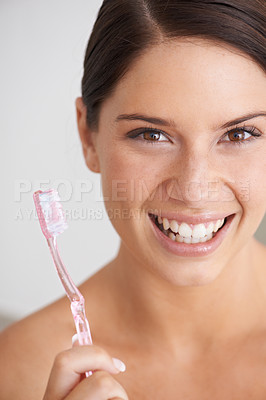 Buy stock photo Toothbrush, smile and portrait of woman in bathroom for dental care, oral hygiene and cleaning. Healthcare, whitening and face of person brushing teeth with toothpaste for wellness and healthy mouth