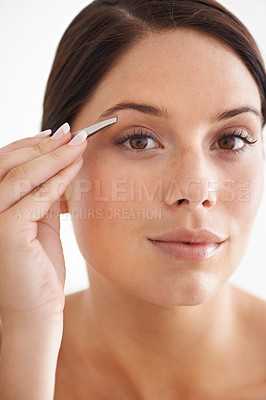Buy stock photo Plucking, eyebrow and portrait of woman with  beauty, tweezers and self care in bathroom. Makeup, routine and girl with hair removal, tools and facial grooming or cleaning for skincare and cosmetics