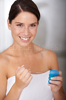 Buy stock photo Flossing, teeth and portrait of woman in bathroom of home with dental, self care and wellness. Cleaning, tooth and gums for oral healthcare in morning, routine or happy for hygiene or grooming