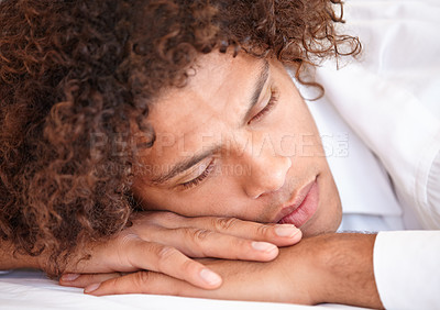 Buy stock photo Sleep, face and man relax on bedroom for comfort, cozy nap and rest for stress relief in home apartment. Dream, exhausted and closeup of sleeping person lying on bed with burnout, tired or eye closed