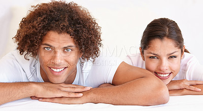 Buy stock photo Smile, relax and portrait of bedroom couple with comfort, cozy and happy weekend break at home. Morning wellness, mattress bed and face of man, woman or marriage people lying on cotton bedsheets