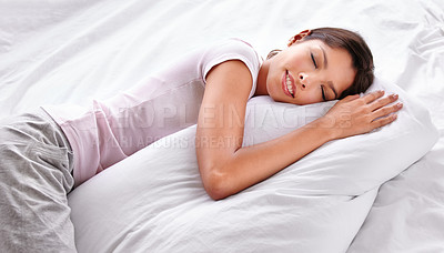 Buy stock photo Sleep, pillow and woman relax in bedroom for comfort, cozy nap and rest with eyes closed in home apartment. Exhausted, fatigue and Mexican person sleeping on mattress bed for burnout, tired or dream
