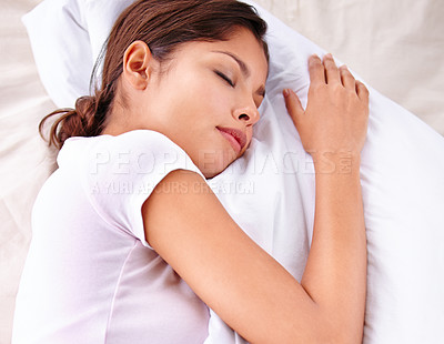 Buy stock photo Sleep, pillow and woman relax in bed for comfort, cozy nap and rest for stress relief in home apartment. Eyes closed, exhausted and top view of sleeping person with burnout, tired or bedroom dream
