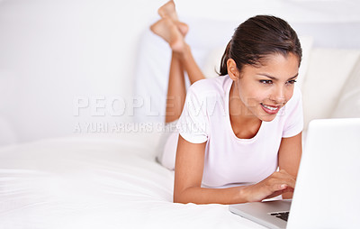 Buy stock photo Smile, bedroom and woman with laptop for online research, social media blog and reading morning news at home. Mockup space, mattress bed and relax person check web search on freelance remote work