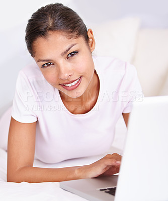 Buy stock photo Portrait, home bed and happy woman with laptop for student research project, e learning and online education. Bedroom, communication and face of studying person with website search on remote work