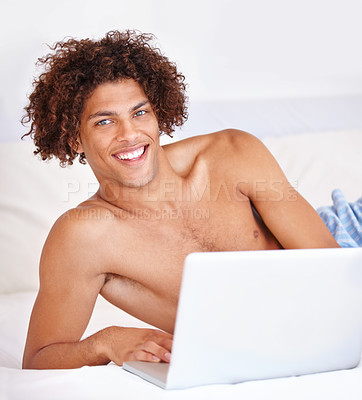 Buy stock photo Laptop, bedroom and portrait of man with smile for work from home blog, social media and morning wellness. Tech, home bed and computer user happy for online report, email or freelance project in USA