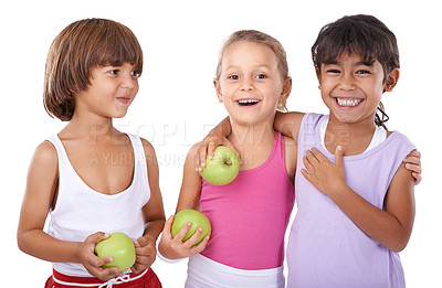 Buy stock photo Three young friends holding apples against a white background