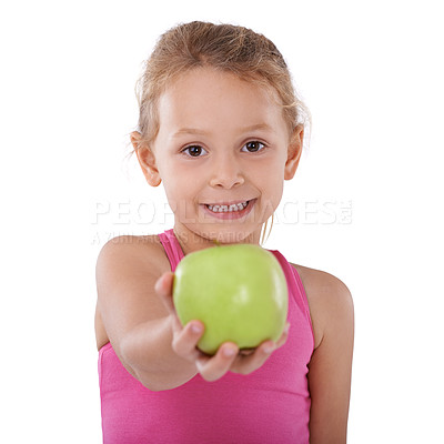 Buy stock photo Portrait, apple or happy child with nutrition, wellness or healthy diet in studio isolated on white background. Food, offer or face of a young girl giving natural fruits for vitamin c with smile