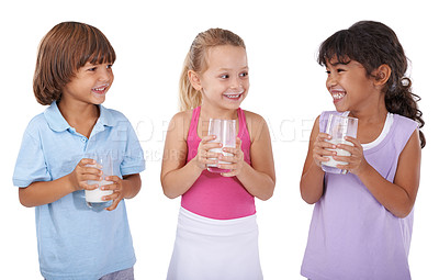 Buy stock photo Friends, children and milk to drink for health, wellness and vitamins, calcium and hydration on white background. Dairy, happy people with milkshake or smoothie with benefits and balance in studio
