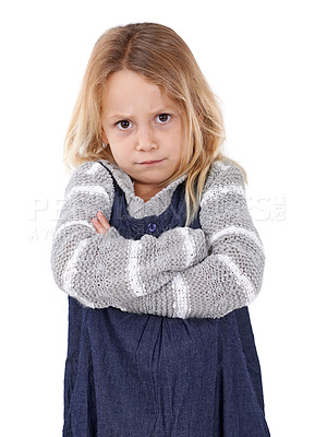Buy stock photo Girl, child and angry in portrait with arms crossed, frustrated and stress, emotion and frown on white background. Youth, upset or disappointed with tantrum, bad attitude with problem in studio