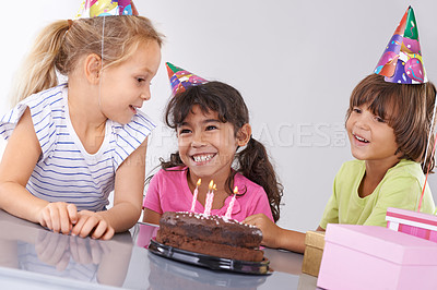 Buy stock photo Friends, children and birthday cake, party and candles with happy people for celebration, youth and dessert. Special day, together in festive mood and kids smile for social event with chocolate
