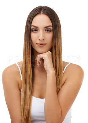 Buy stock photo Studio portrait of an attractive model with her hand on her chin isolated on white