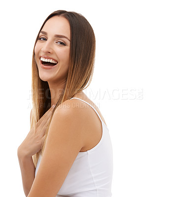 Buy stock photo A young woman laughing happily while looking at the camera